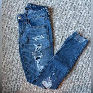 American Eagle distressed jeggings with shark bite ankles. Size 2.